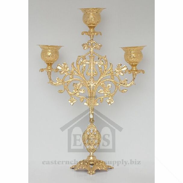 Gold-plated three-branched candelabrum with votive glass sockets