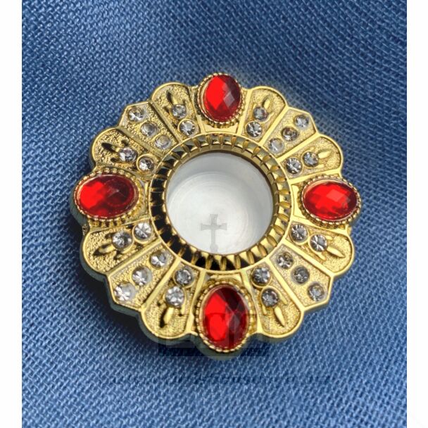 Reliquary - Starburst design with red and clear crystals